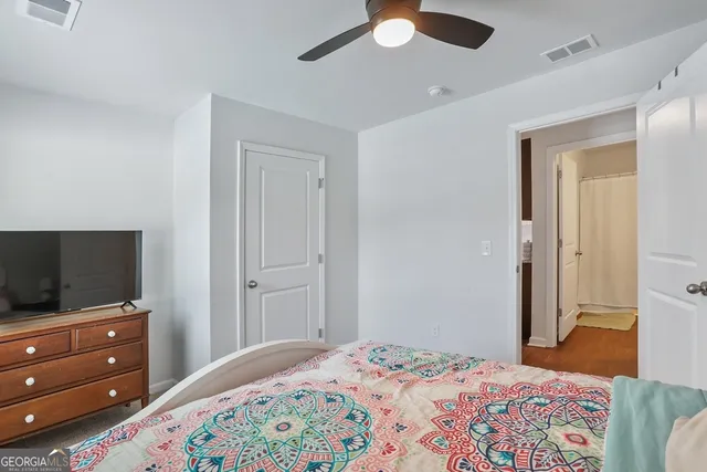 a view of staircase with white walls