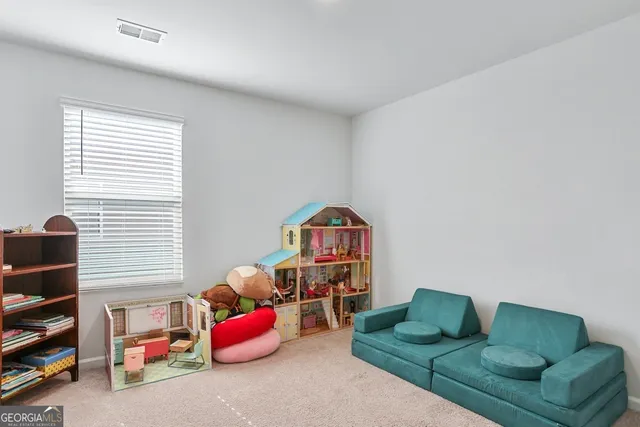 a bedroom with a bed and a table