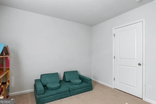 a view of a terrace with sitting area