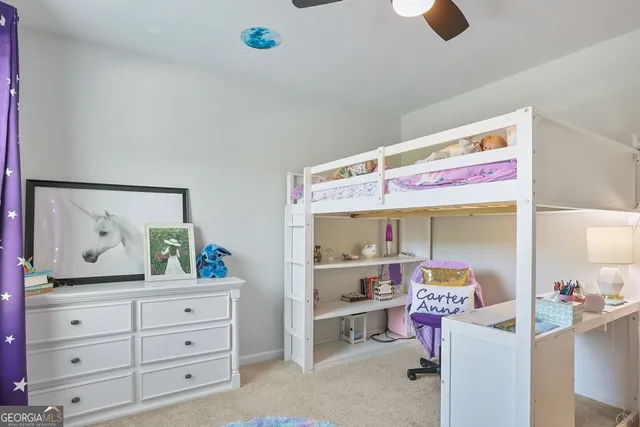 a view of a swimming pool with an outdoor space and seating area
