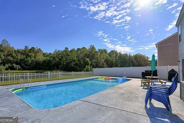 a view of a golf course with a lake