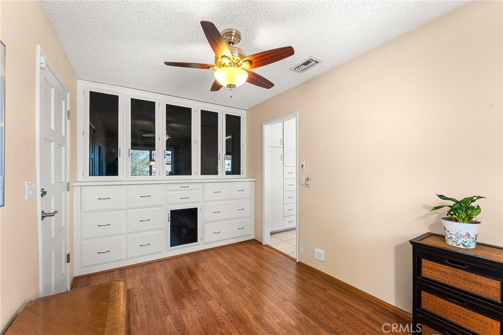 13346 Rimview Court Yucaipa, CA 92399 - Photo 11 of 60 a bedroom with a bed and a window