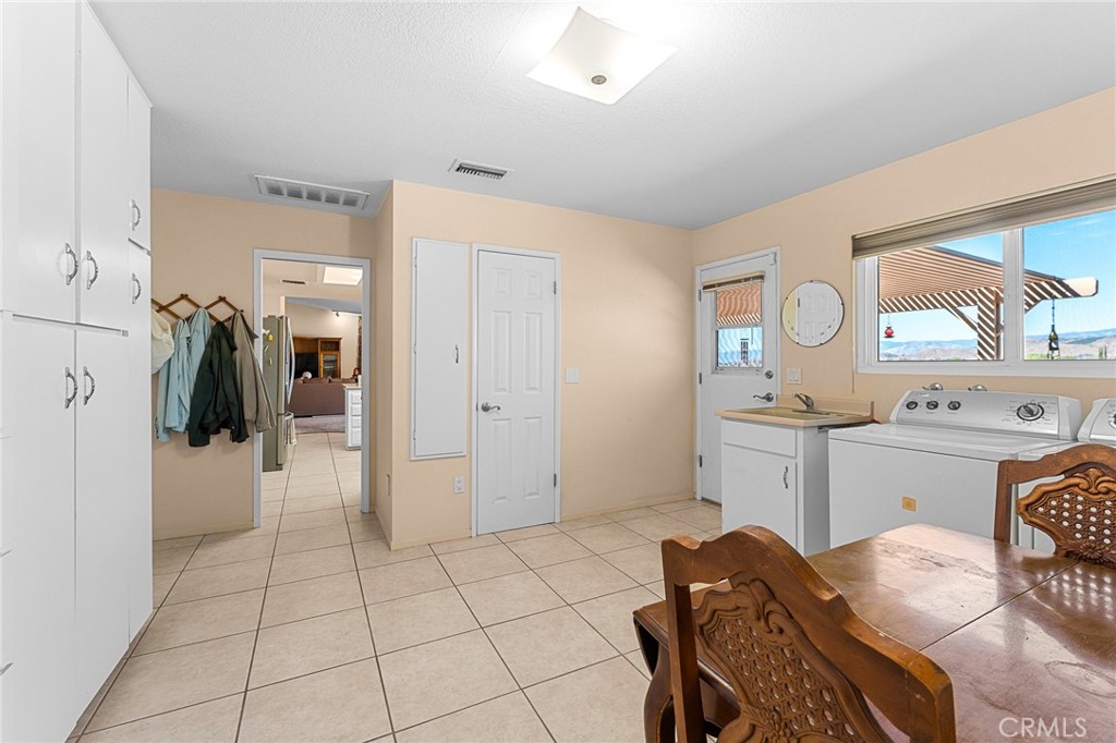 13346 Rimview Court Yucaipa, CA 92399 - Photo 24 of 60 a bedroom with a bed and a view of bedroom