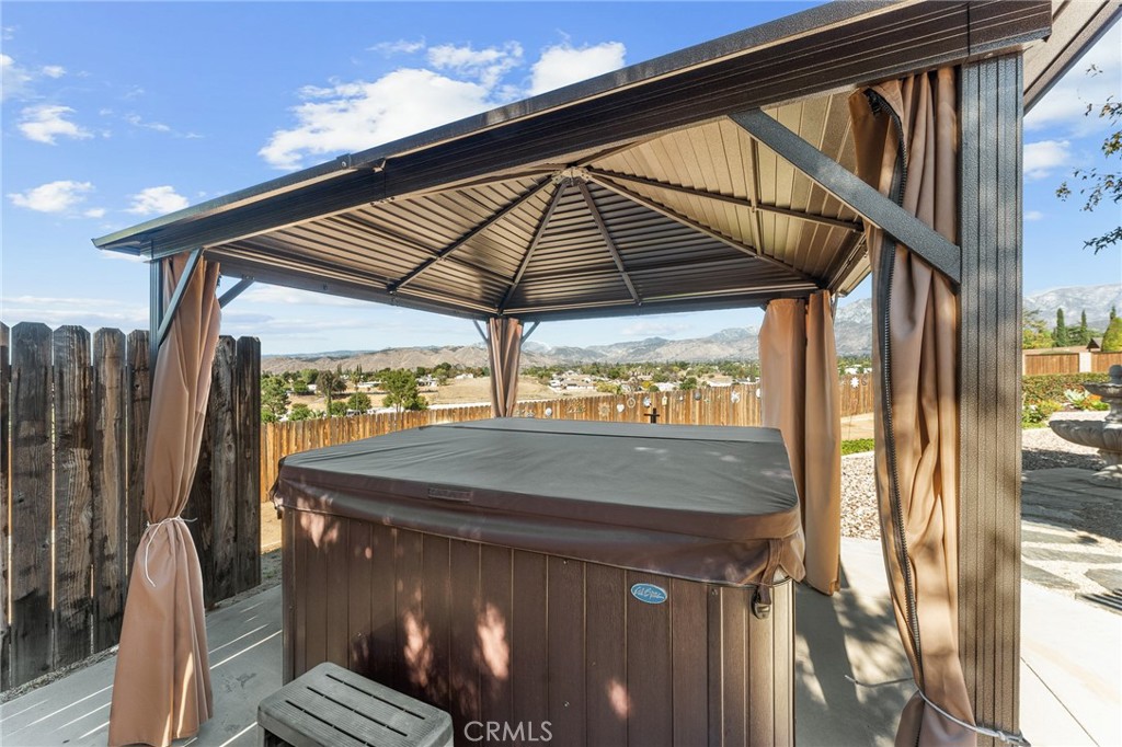 13346 Rimview Court Yucaipa, CA 92399 - Photo 37 of 60 Bubbling Spa with cabana drapes