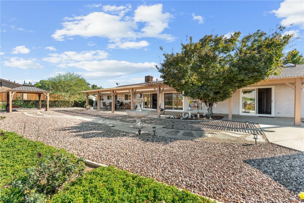 13346 Rimview Court Yucaipa, CA 92399 - Photo 47 of 60 a front view of a house with a yard