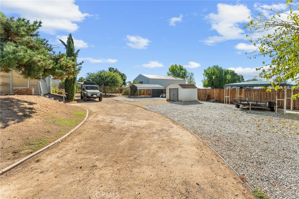 13346 Rimview Court Yucaipa, CA 92399 - Photo 49 of 60 a view of a house with a patio