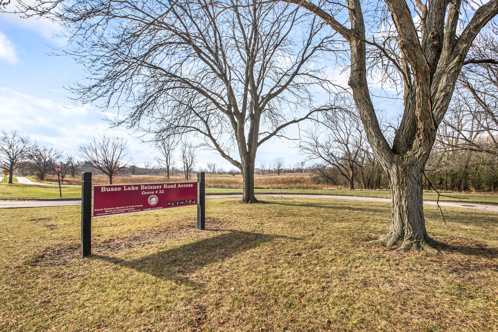 817 Pahl Road Elk Grove Village, IL 60007 - Photo 16 of 17 a sign board with yard in the back