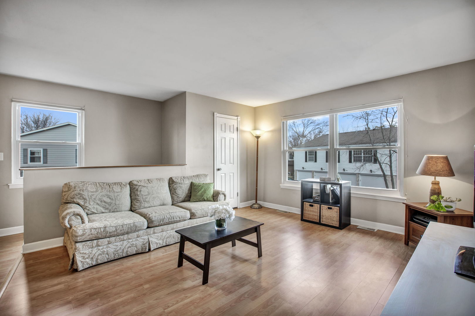 817 Pahl Road Elk Grove Village, IL 60007 - Photo 4 of 17 a living room with furniture and a large window