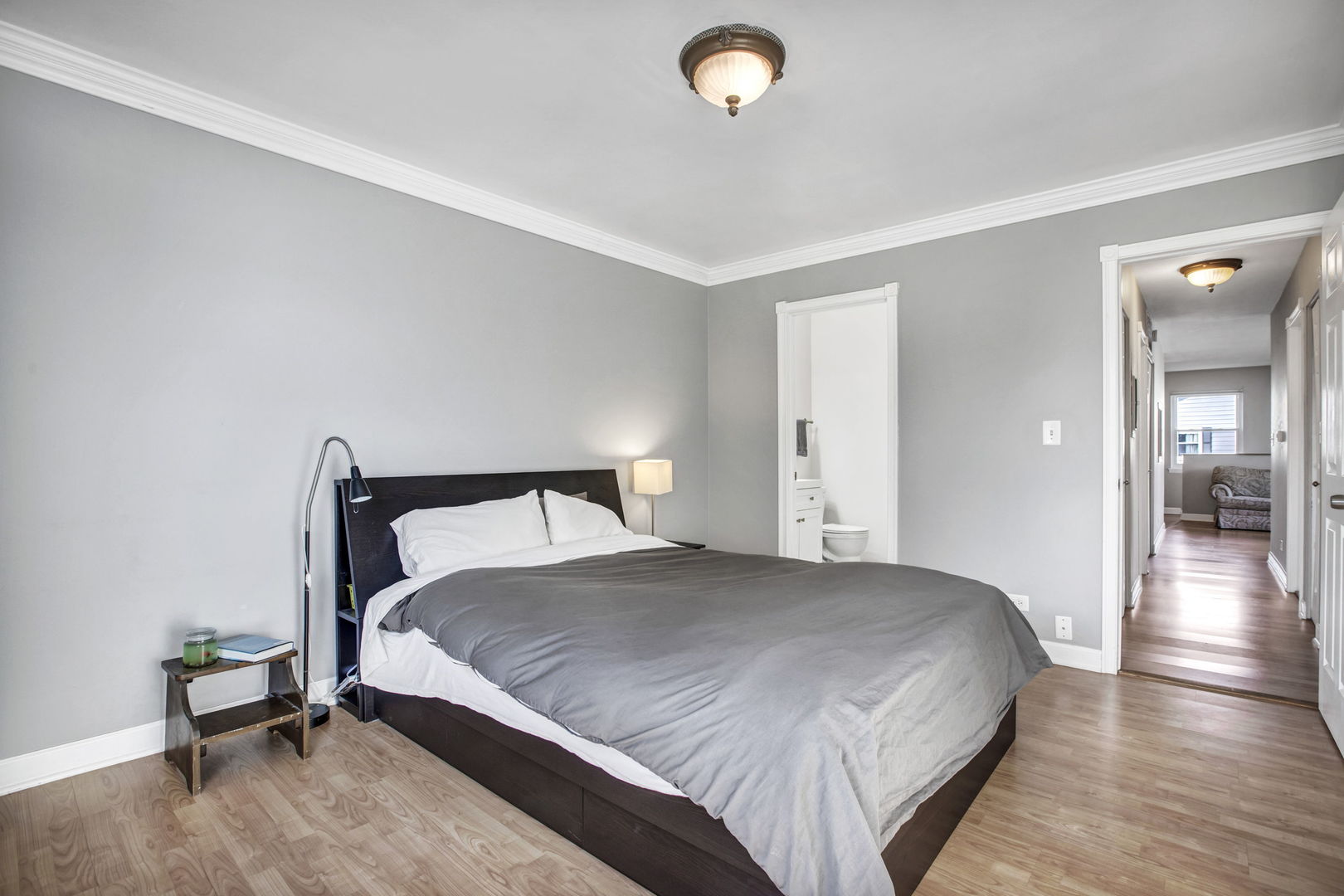 817 Pahl Road Elk Grove Village, IL 60007 - Photo 10 of 17 a bedroom with a bed and wooden floor