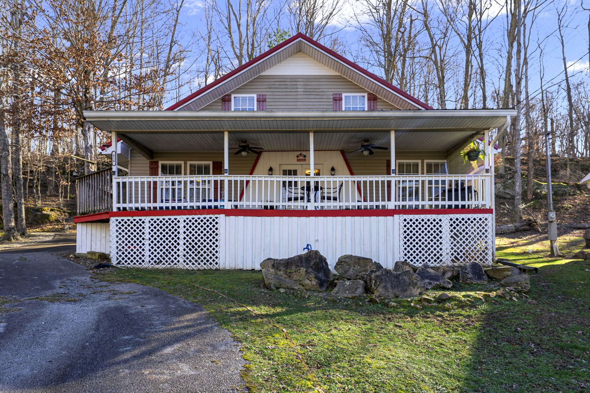 419 Jackie Dukes Road Lewisburg, KY 42256 - Photo 2 of 55 a front view of a house with a garden and deck
