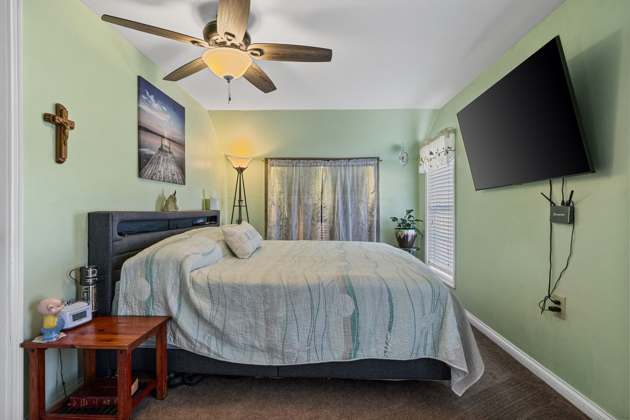 419 Jackie Dukes Road Lewisburg, KY 42256 - Photo 29 of 55 a bedroom with a bed and a flat screen tv