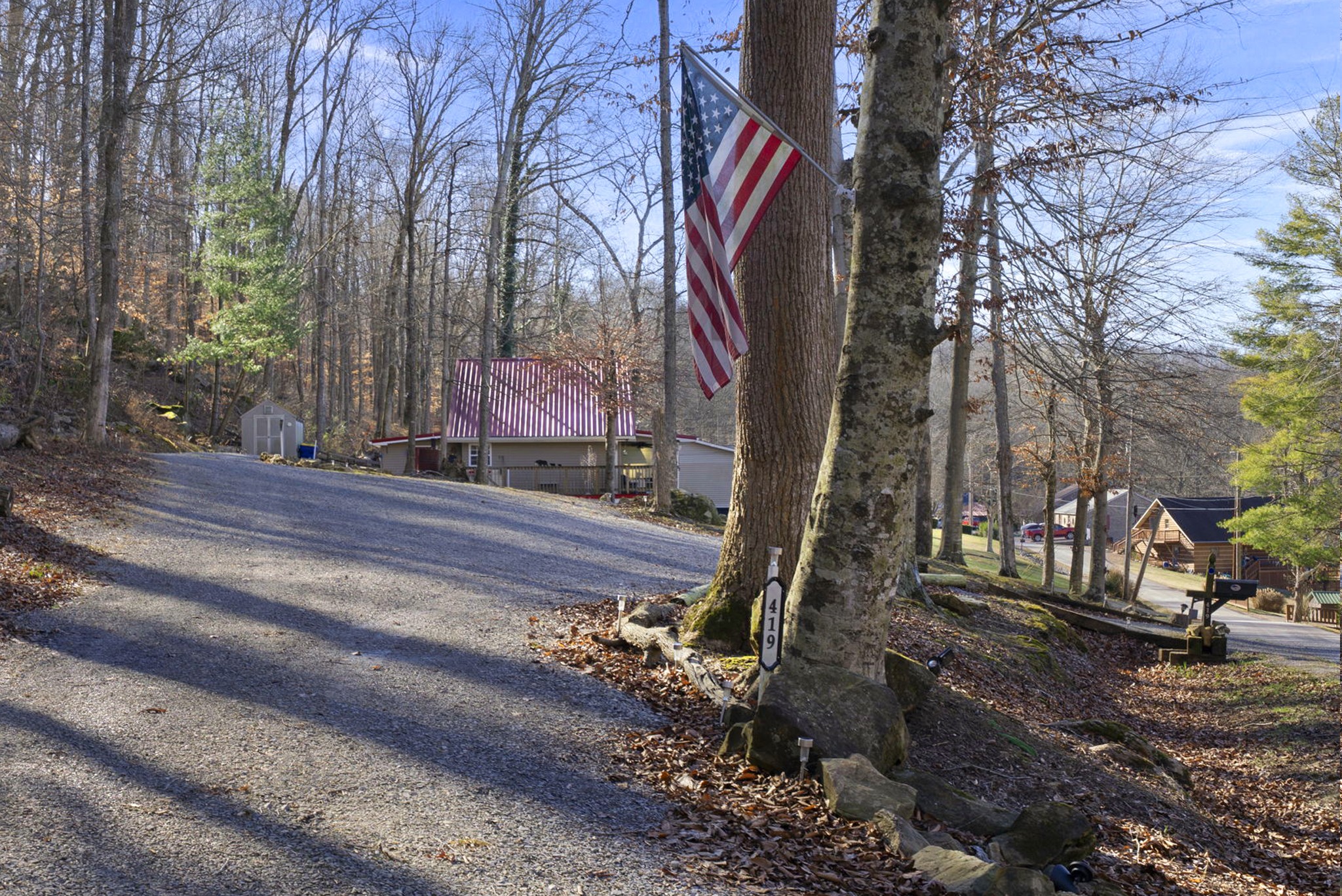 419 Jackie Dukes Road Lewisburg, KY 42256 - Photo 44 of 55 a sign that is sitting on a sidewalk