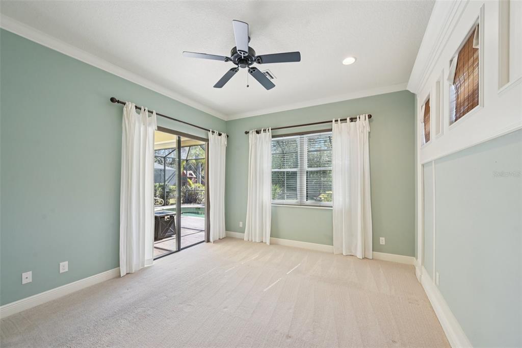 7526 Rio Bella Place Bradenton, FL 34201 - Photo 21 of 40 a view of an empty room with a window