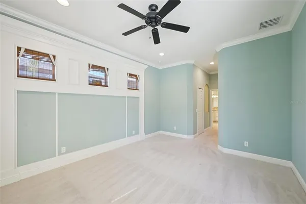 a spacious bathroom with a double vanity sink and a mirror