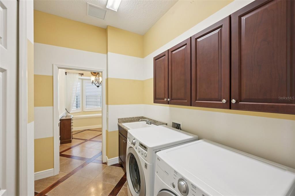 7526 Rio Bella Place Bradenton, FL 34201 - Photo 33 of 40 a bathroom with a sink and a mirror