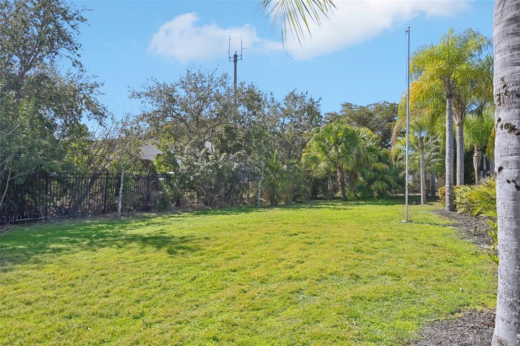 7526 Rio Bella Place Bradenton, FL 34201 - Photo 37 of 40 a view of a field with a tree