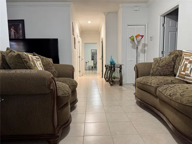 a living room with furniture and a couch