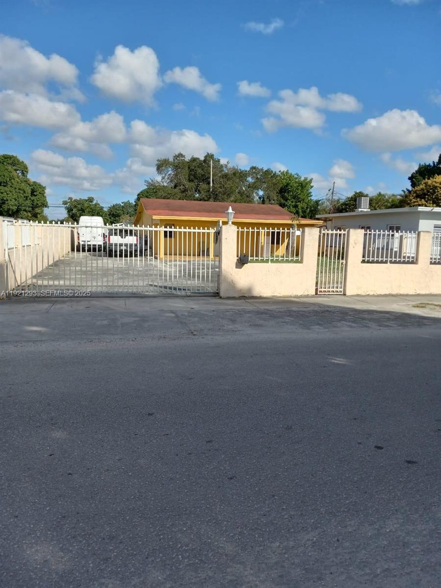 3041 Northwest 95th Terrace Miami, FL 33147 - Photo 22 of 22 a view of a city street next to a building
