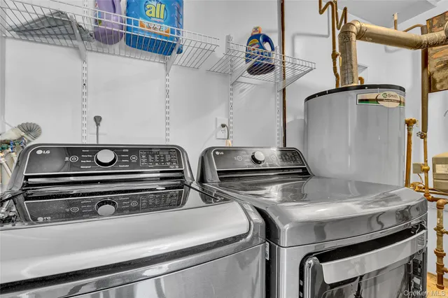 a view of a kitchen with appliances and cabinets