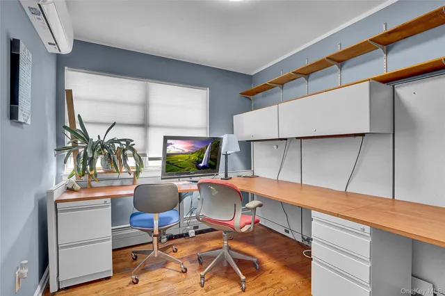 a workspace with furniture and window