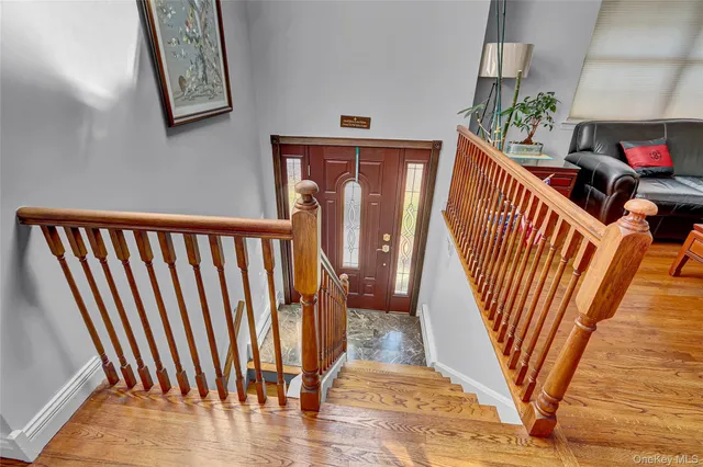 a view of entryway with wooden floor