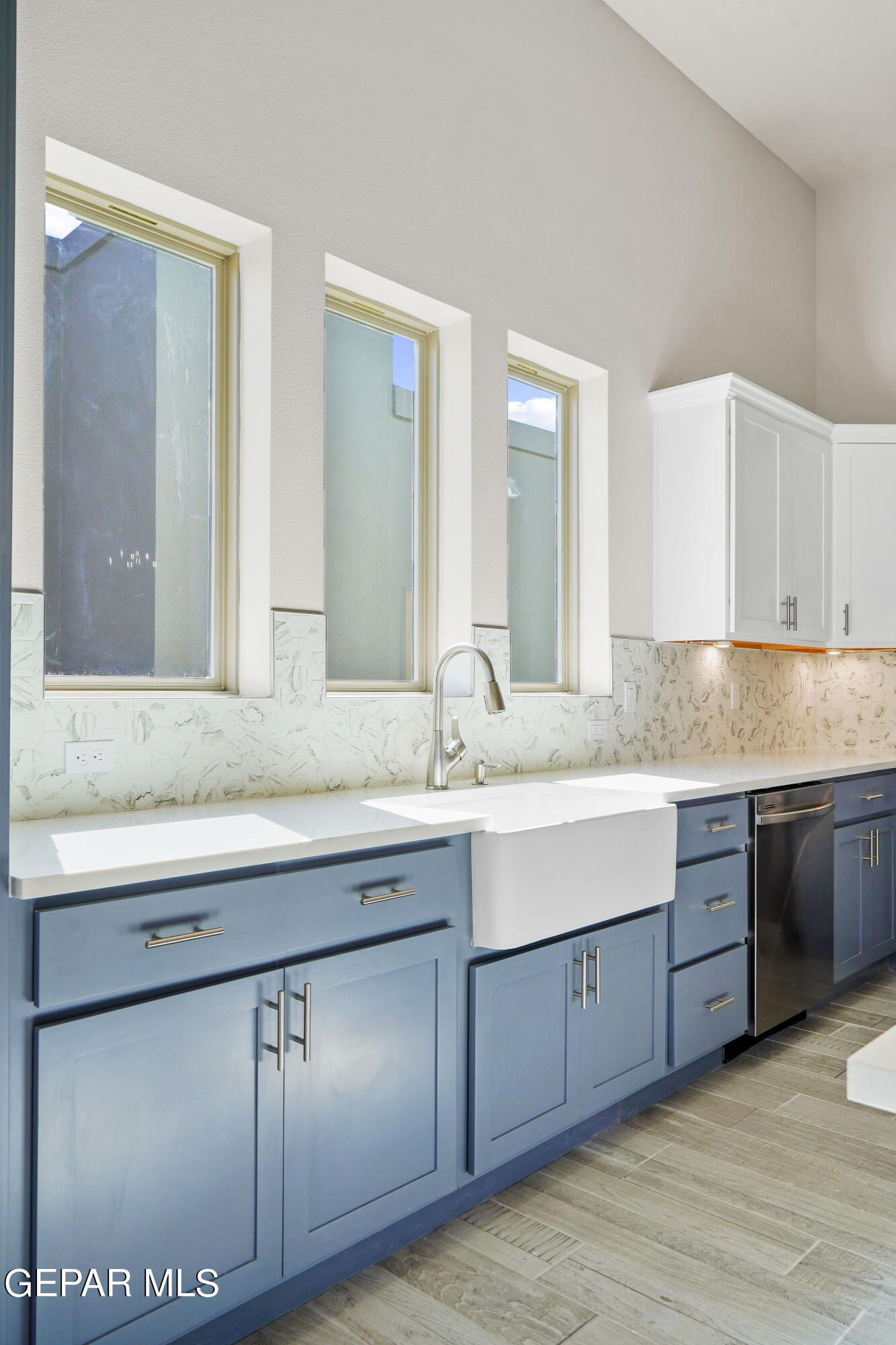 1734 Bit Way El Paso, TX 79911 - Photo 10 of 52 a bathroom with a granite countertop double sink and a mirror