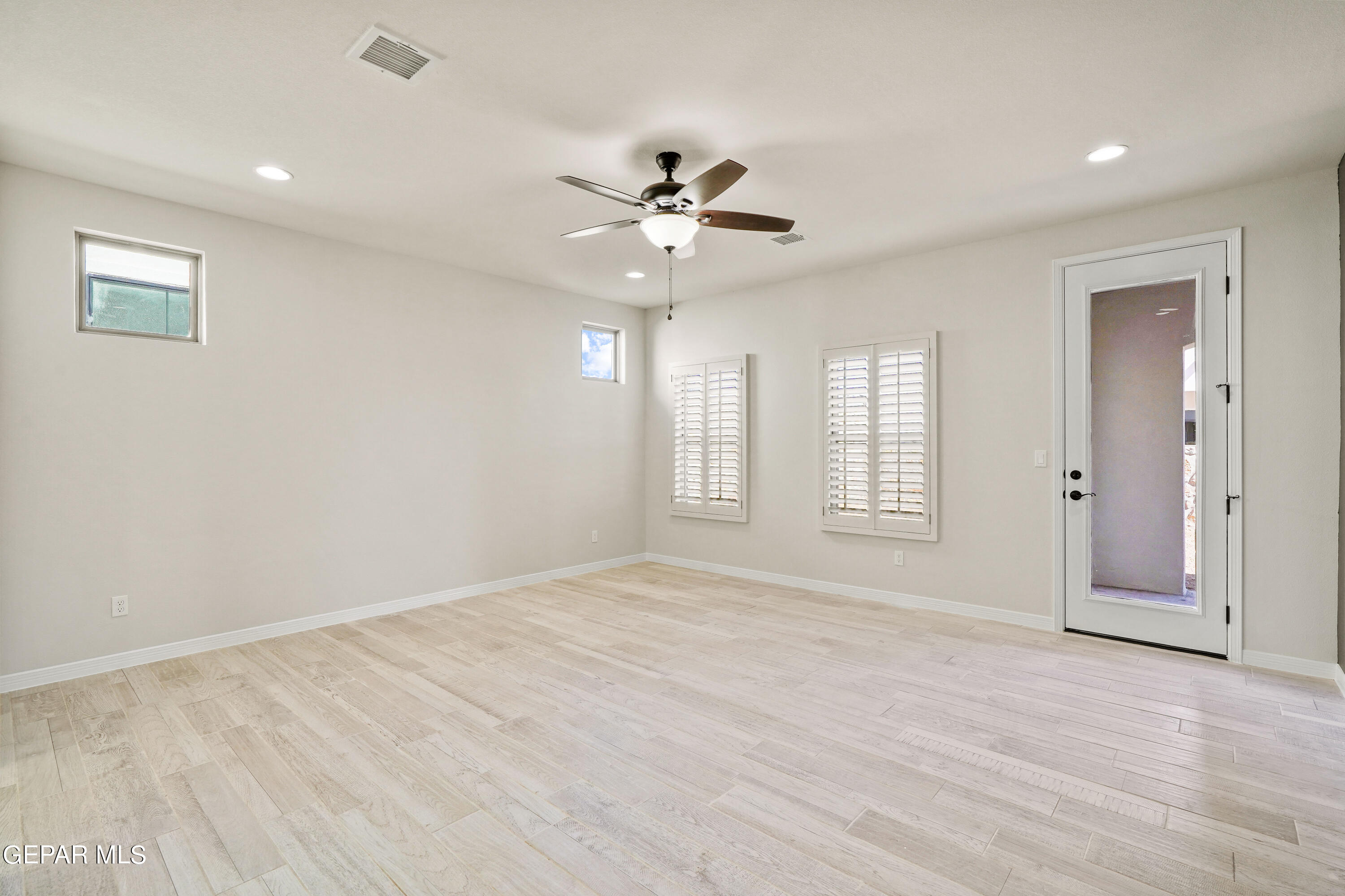 1734 Bit Way El Paso, TX 79911 - Photo 20 of 52 a view of an empty room with a window