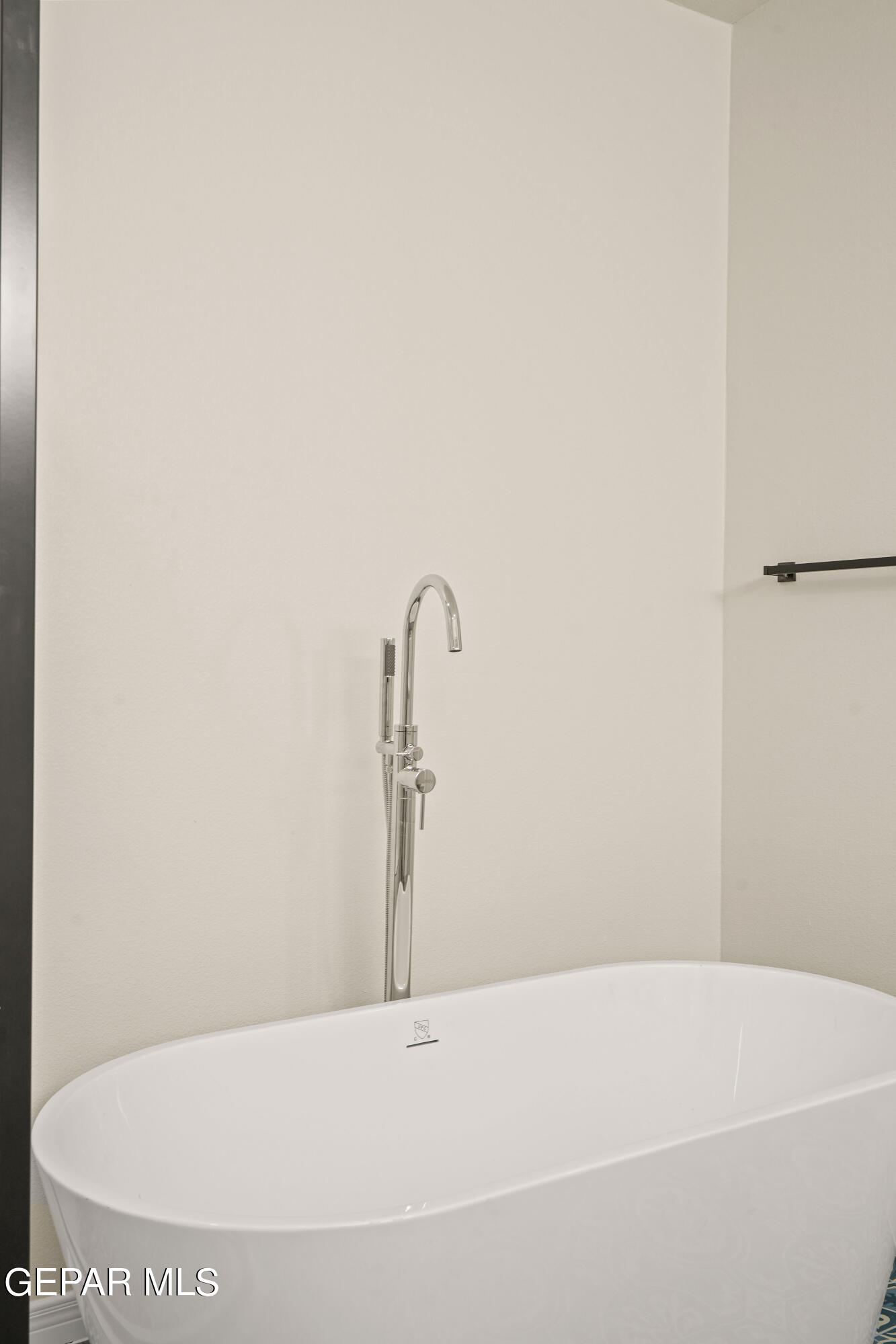 1734 Bit Way El Paso, TX 79911 - Photo 33 of 52 a bathroom with a bathtub