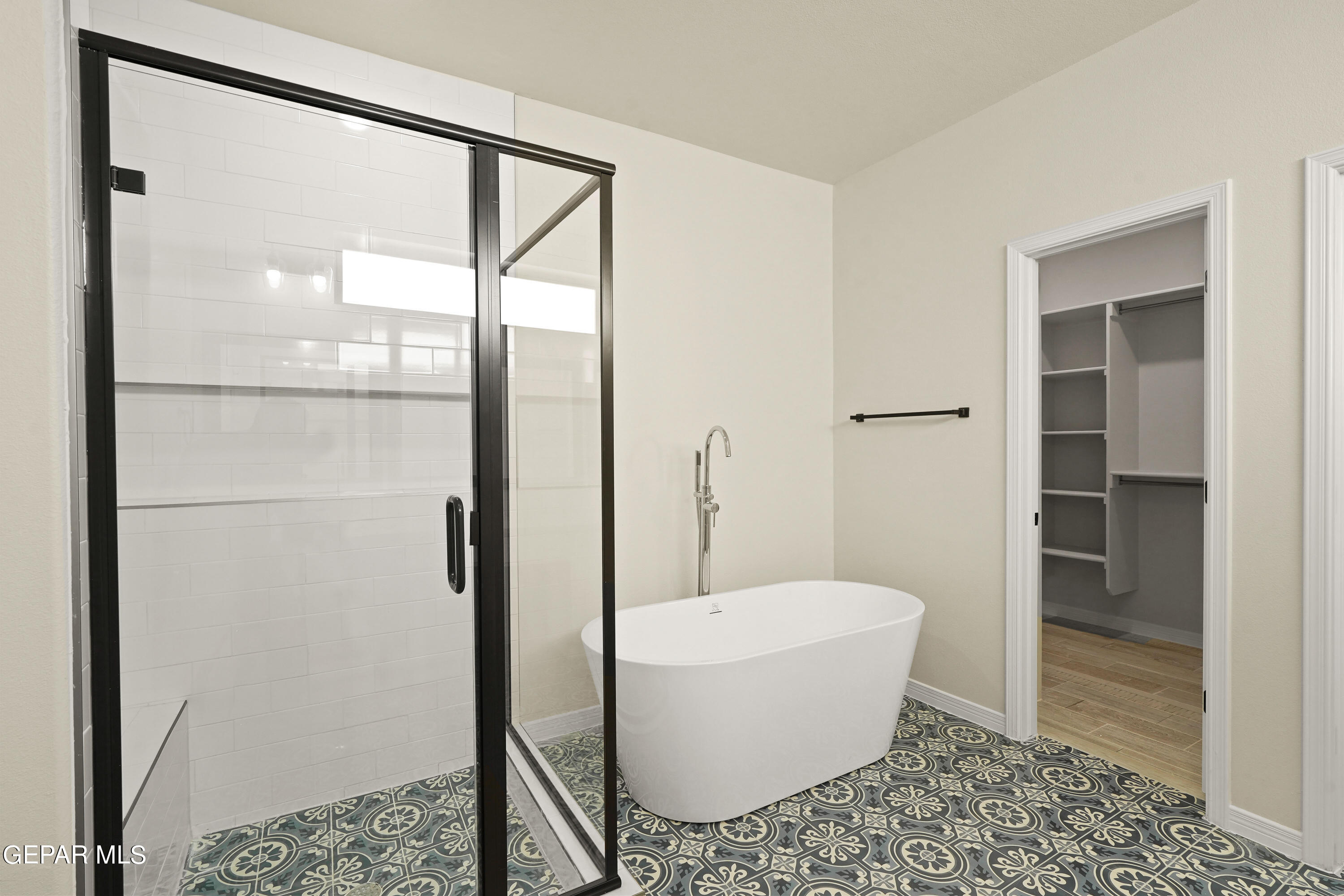 1734 Bit Way El Paso, TX 79911 - Photo 35 of 52 a bathroom with a toilet and a shower