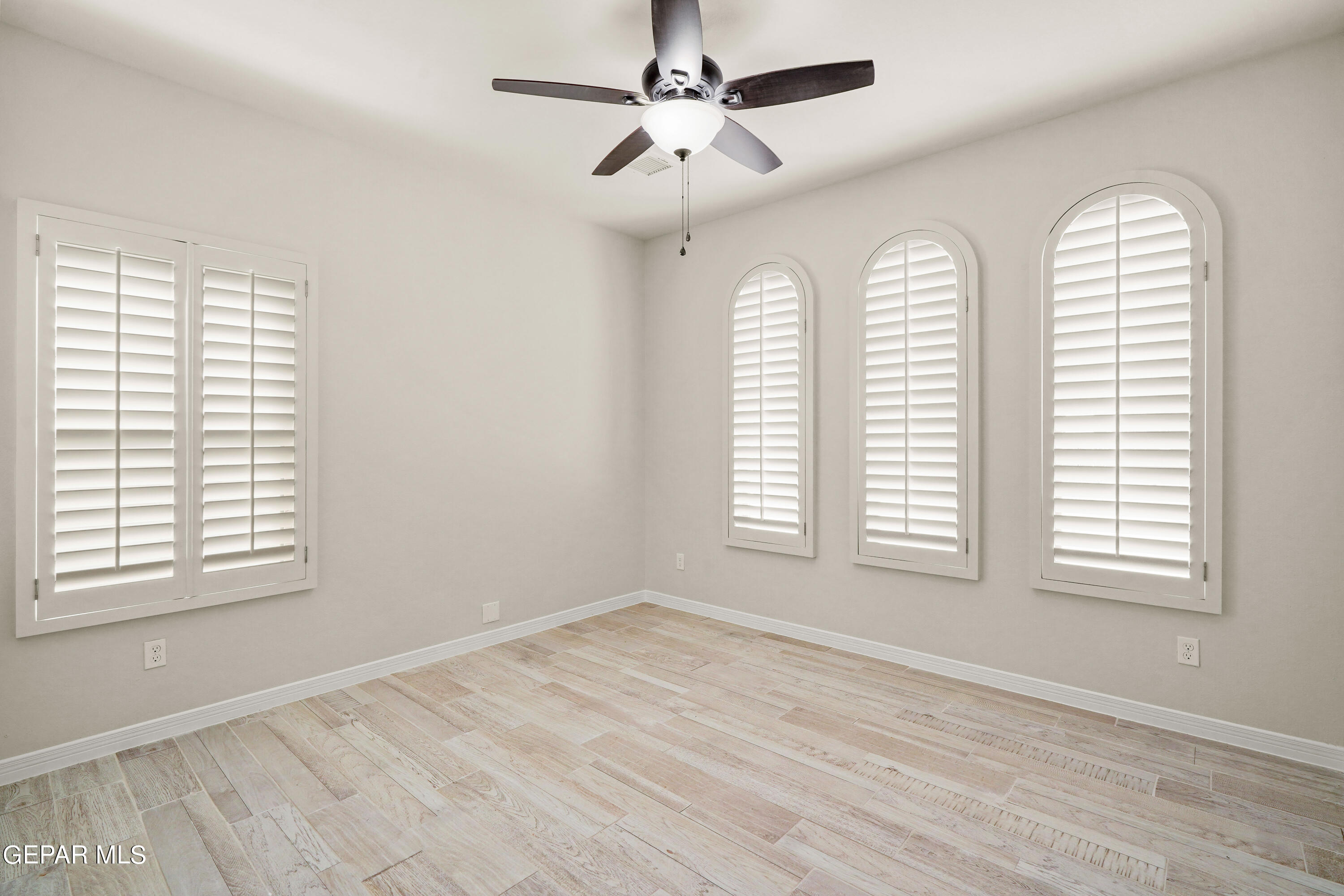 1734 Bit Way El Paso, TX 79911 - Photo 46 of 52 a view of an empty room with a window