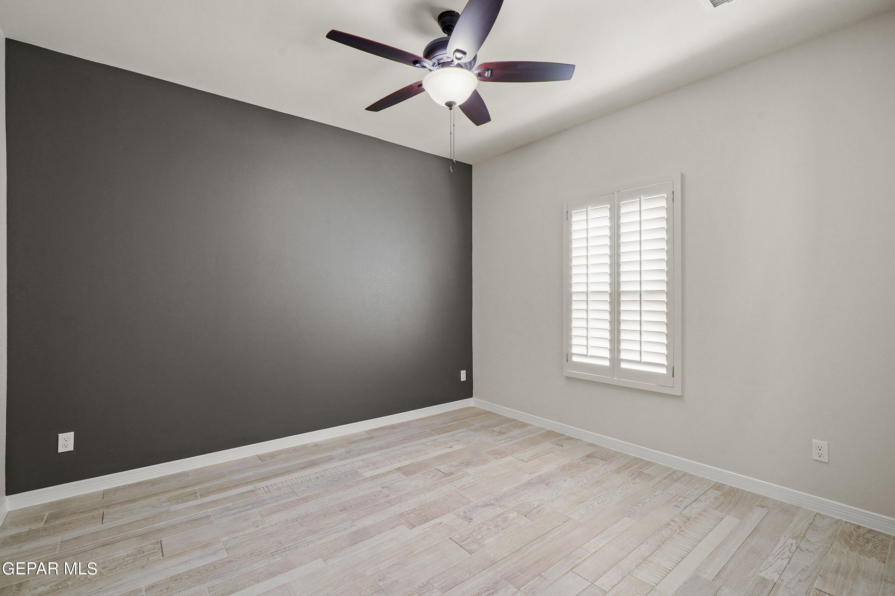 1734 Bit Way El Paso, TX 79911 - Photo 48 of 52 an empty room with windows and fan