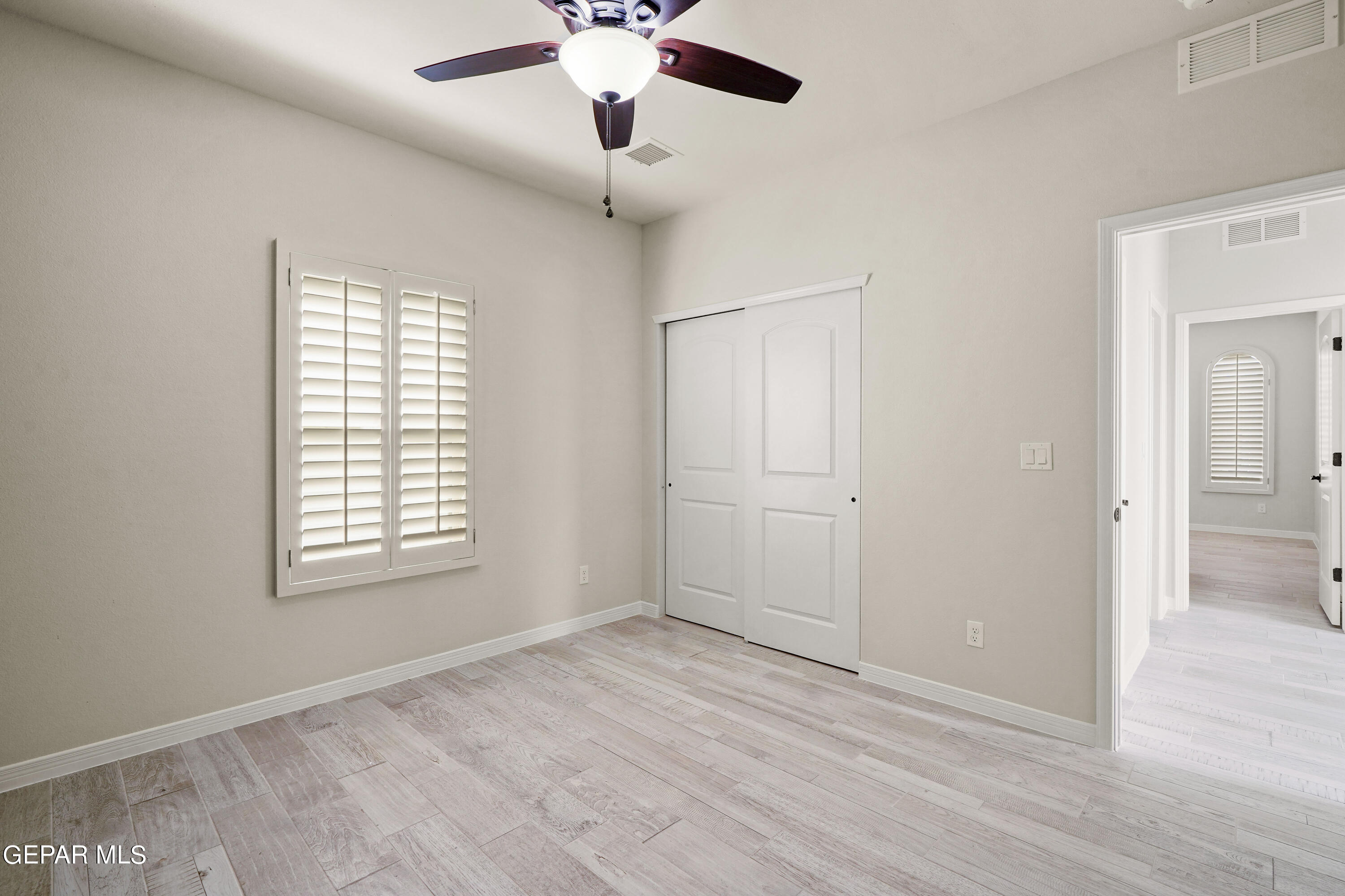 1734 Bit Way El Paso, TX 79911 - Photo 49 of 52 a view of an empty room with a window