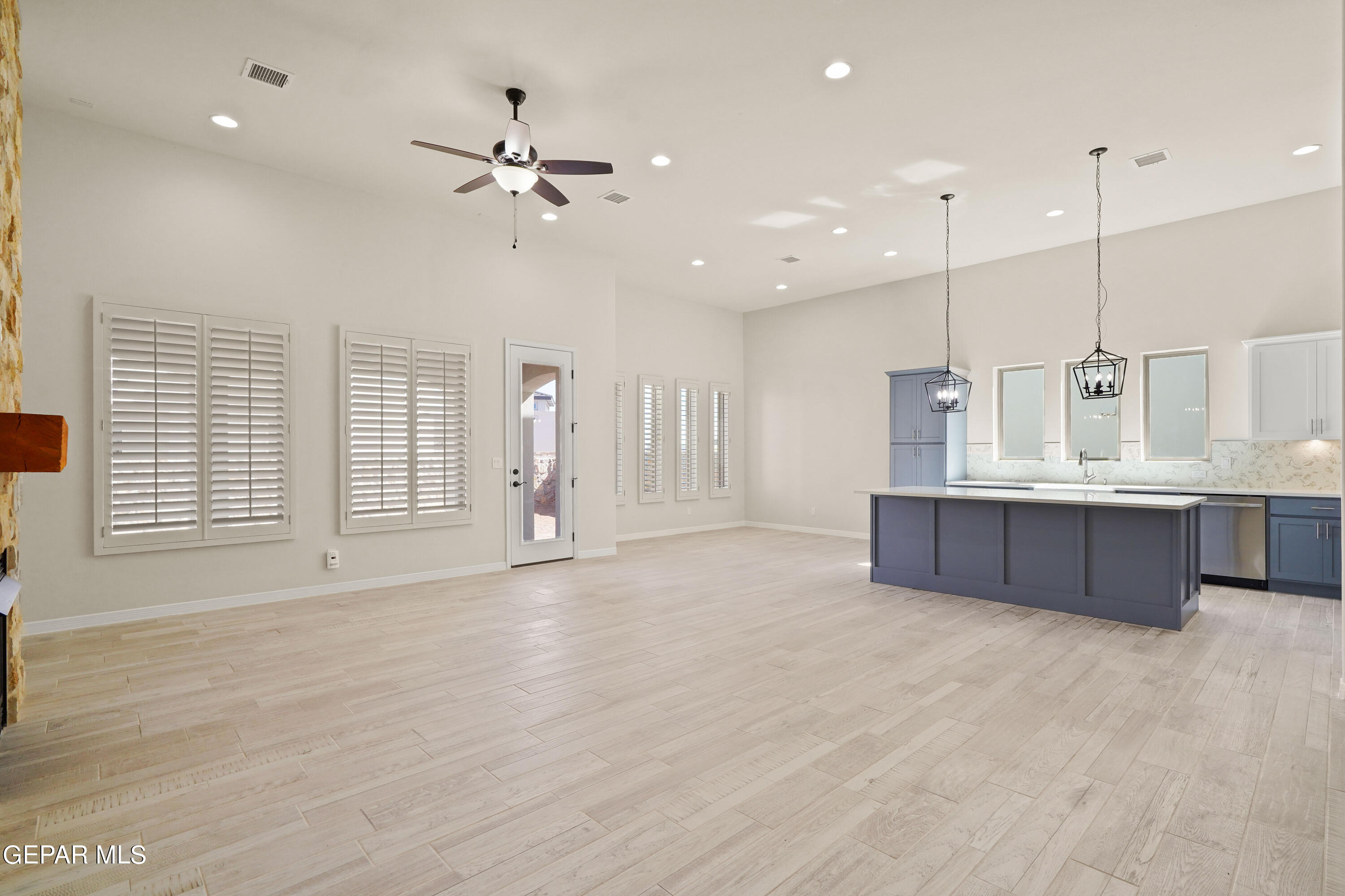 1734 Bit Way El Paso, TX 79911 - Photo 5 of 52 a view of a kitchen with a sink and a window