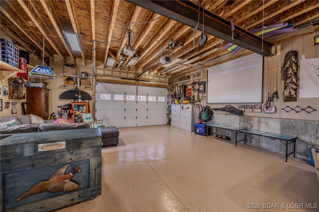 81 Restless Point Camdenton, MO 65020 - Photo 62 of 75 Epoxy floors, heated & cooled-8x14 overhead door,