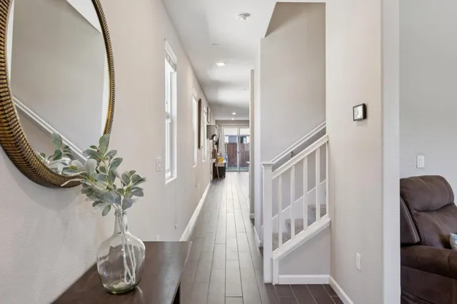 a view of a hallway with front door
