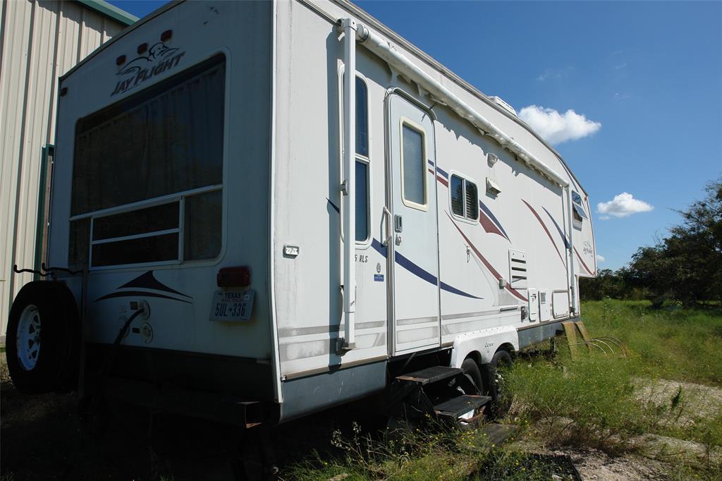 131 County Road 317 Goldthwaite, TX 76844 - Photo 10 of 39 a house with trees in front of it