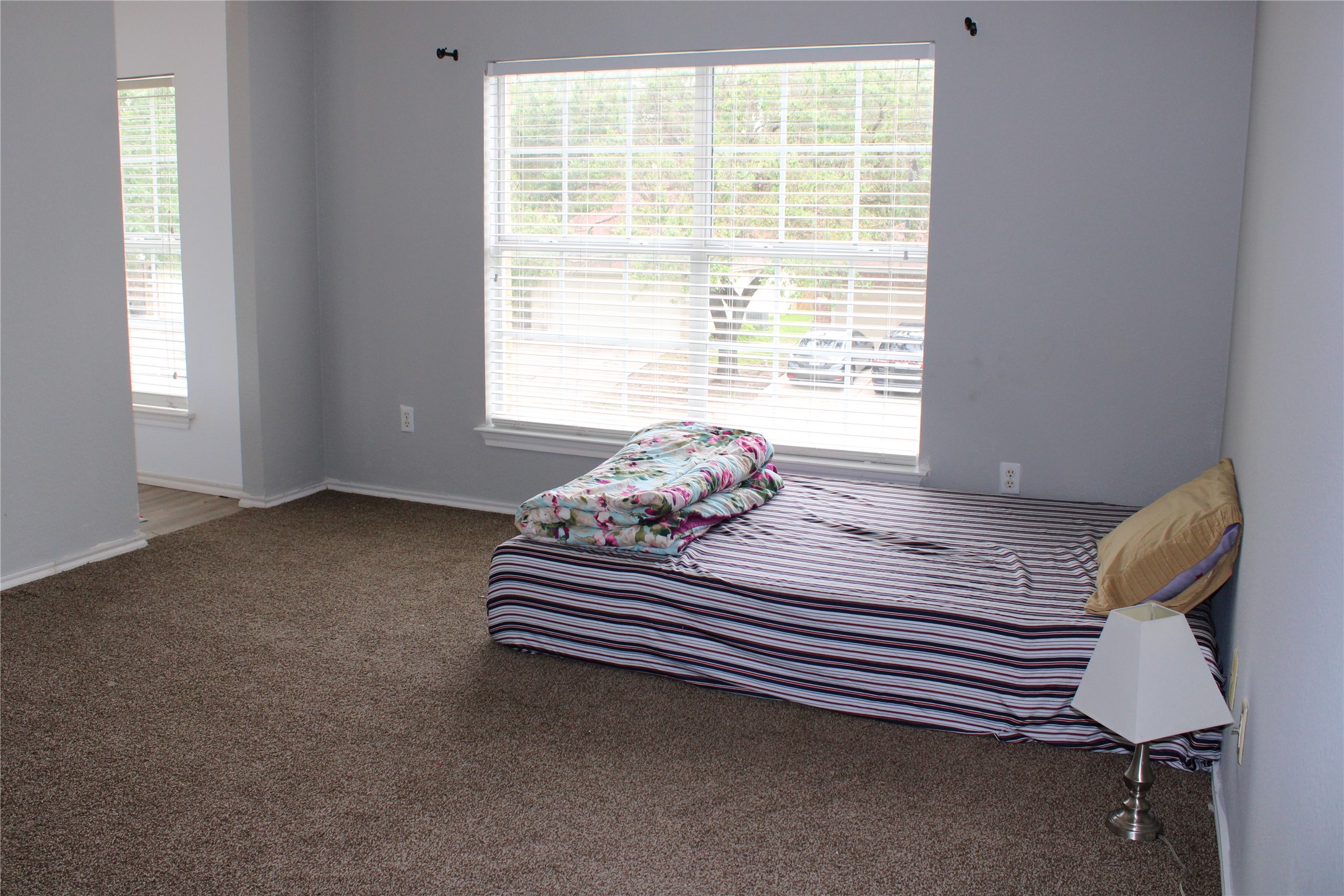 16205 Glorious Lane Pflugerville, TX 78660 - Photo 26 of 30 a bedroom with a bed and a window