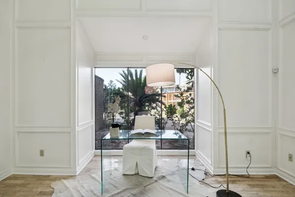 a room with table and chairs