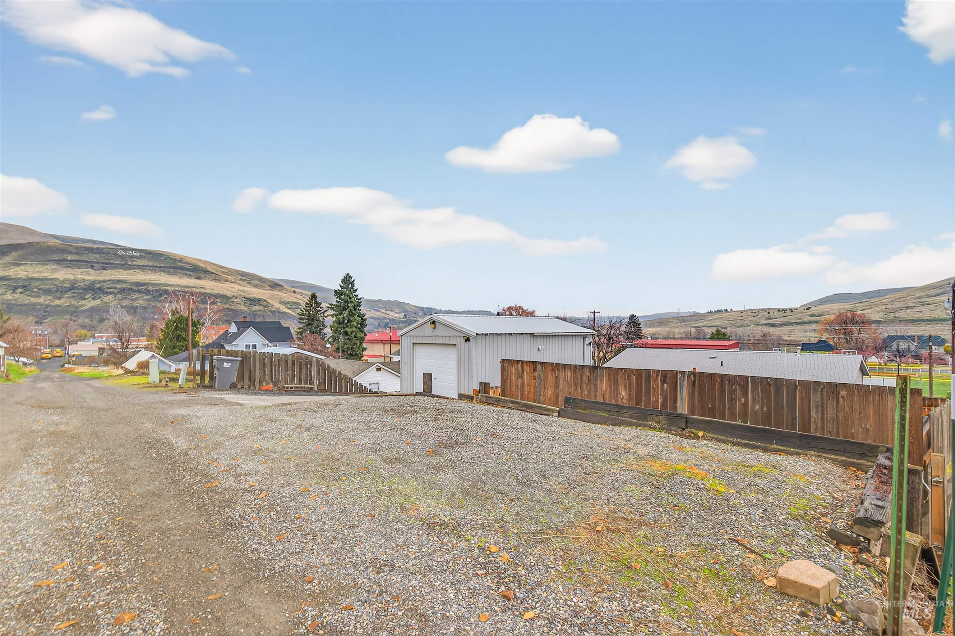 406 2nd Street Asotin, WA 99402 - Photo 33 of 37 View of side of property featuring a mountain view and a garage