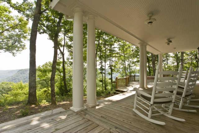 172 Ingman Cliff Road Tracy City, TN 37387 - Photo 14 of 18 Covered porch at the brow rim offers a panoramic view of receding ridgetops and valley slopes - bring your own rocker and relax to the sights and sounds of the Cumberland Plateau, just minutes from Sewanee and I-24!