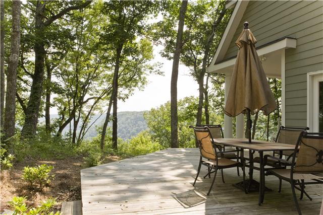 172 Ingman Cliff Road Tracy City, TN 37387 - Photo 4 of 18 Al fresco dining on deck with a view, just outside kitchen/dining area!