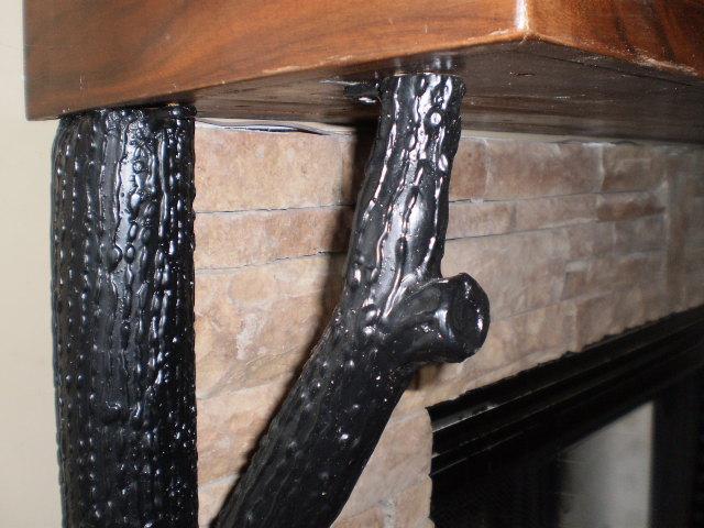 172 Ingman Cliff Road Tracy City, TN 37387 - Photo 9 of 18 Closeup of custom iron work and mantel on fireplace surround. Custom iron work also at entry gate and stair railings!