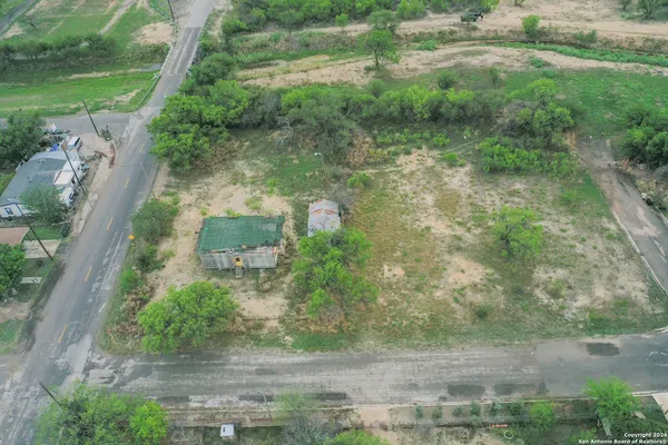 an aerial view of residential house with outdoor space