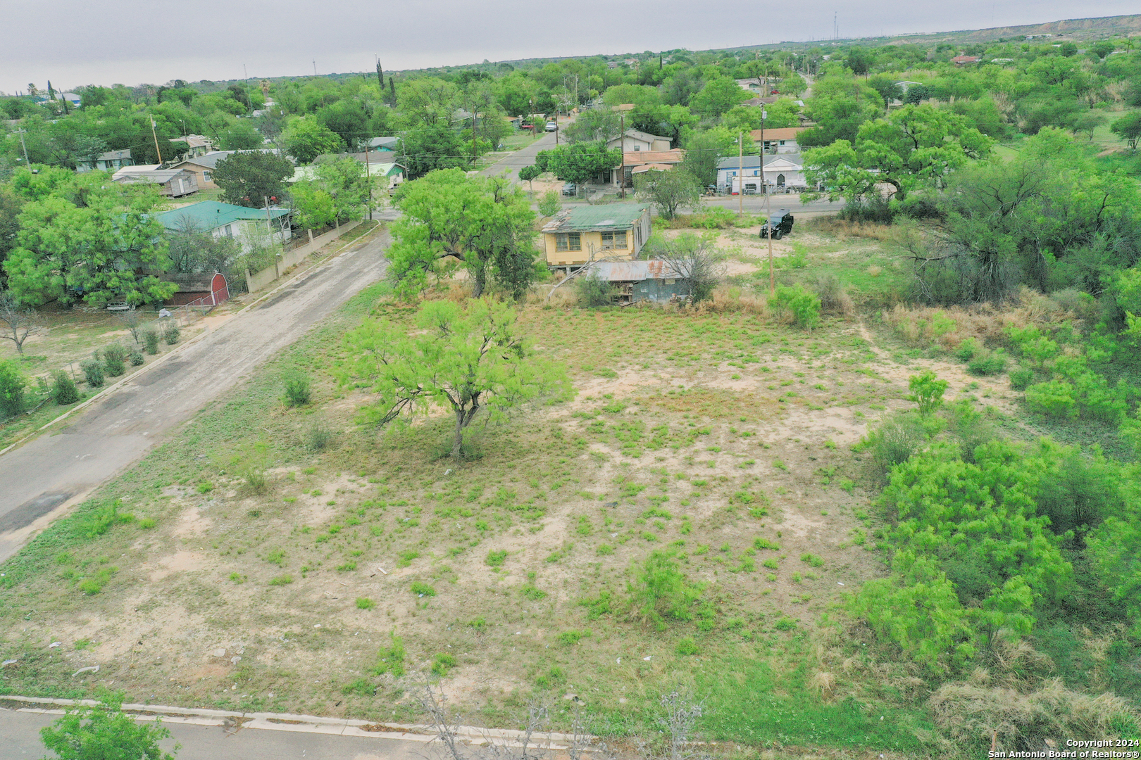 3000 West Broadbent Del Rio, TX 78840 - Photo 11 of 13 a view of a garden with a building
