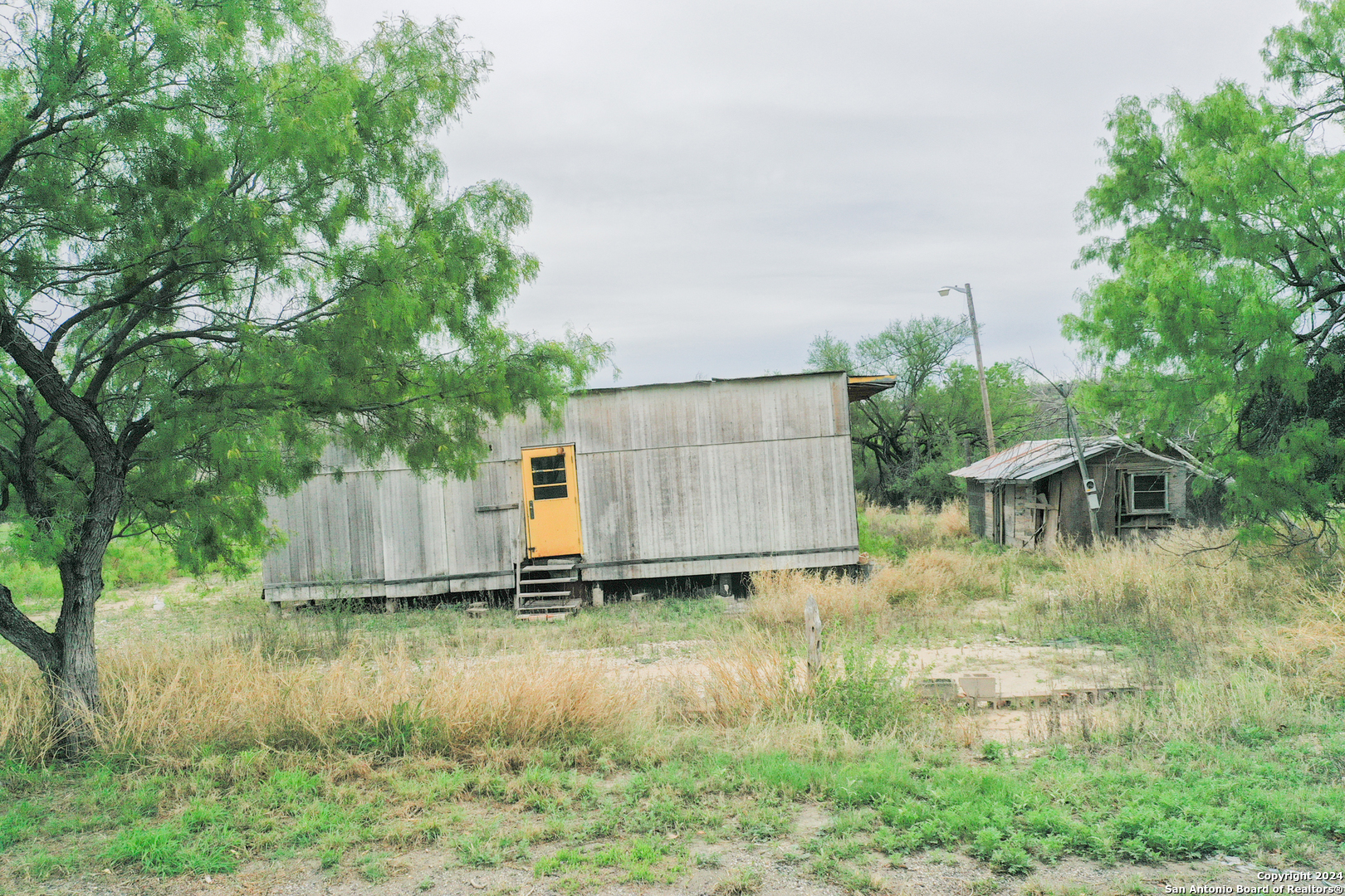 3000 West Broadbent Del Rio, TX 78840 - Photo 9 of 13 a backyard of a house with lots of green space