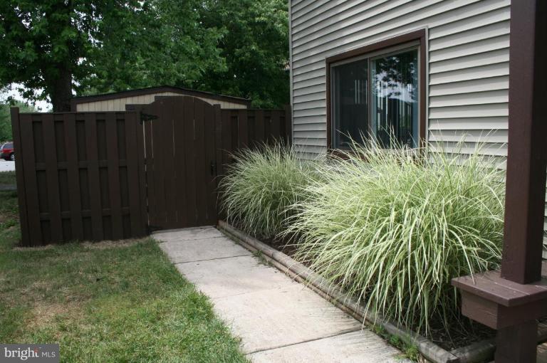 Private Fenced Patio with TWO sheds!