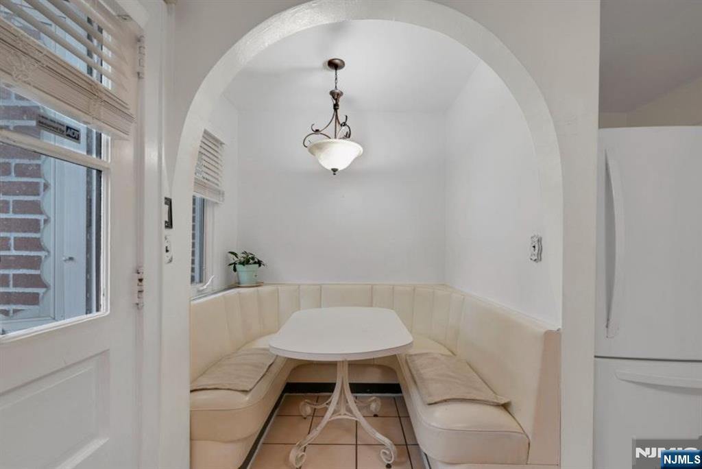 497 Oakdene Avenue Ridgefield, NJ 07657 - Photo 12 of 28 a bathroom with a sink and a mirror