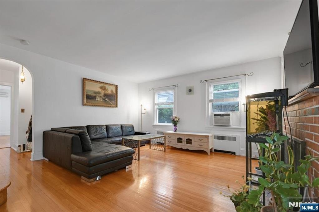 497 Oakdene Avenue Ridgefield, NJ 07657 - Photo 6 of 28 a living room with furniture and a window