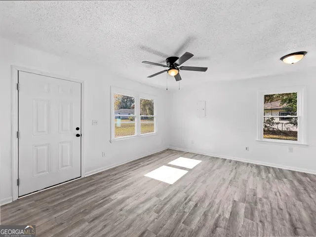 a bathroom with a sink and a window