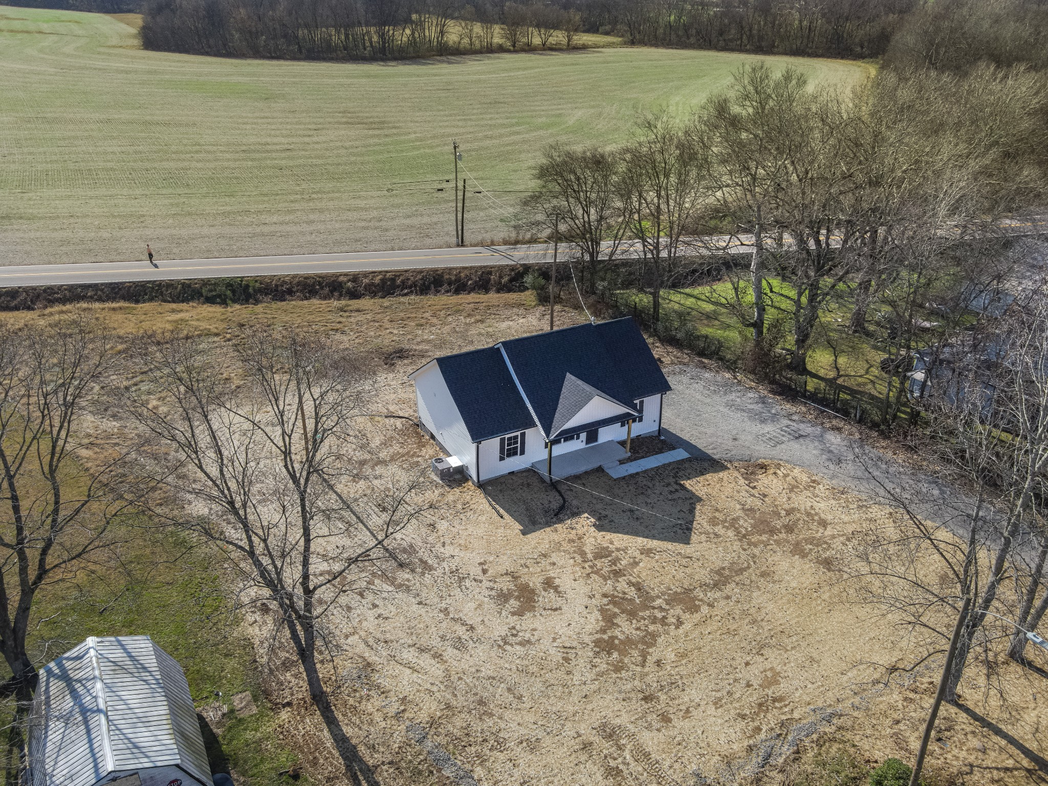 7 Orchard Cemetery Road Petersburg, TN 37144 - Photo 14 of 53 a view of a backyard with chairs